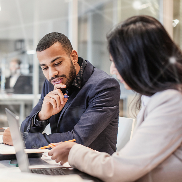 A Man and Woman Discussing a Breach Response Plan