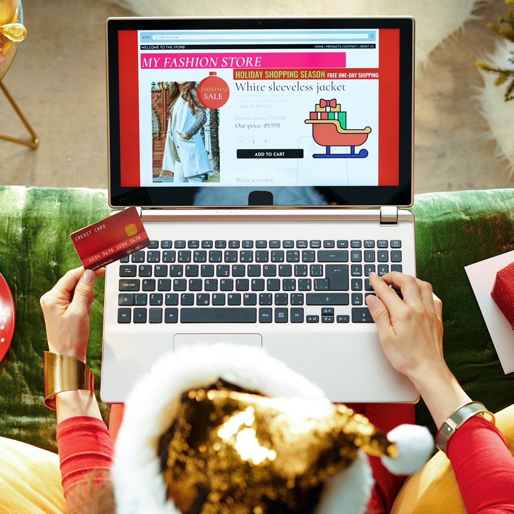 Image of holiday cyber shopping to represent consumer privacy threats and identity theft