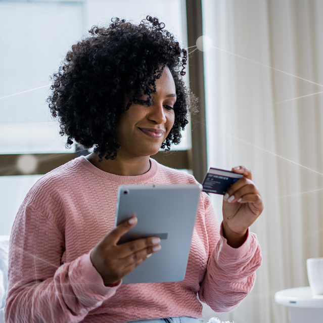 A Woman Checking her Credit Report on a Tablet